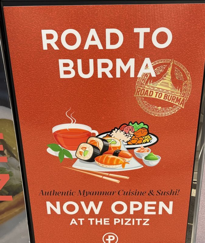 Road To Burma Now Open at The Pizitz sidewalk sign